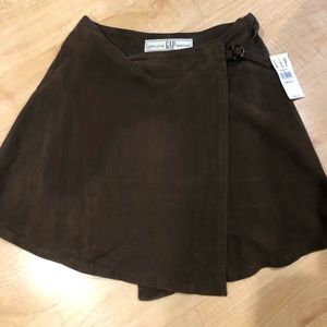 Brown leather mini skirt.